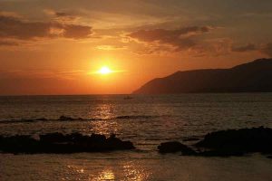 Kreta Sonnenuntergang mit Fischer boot